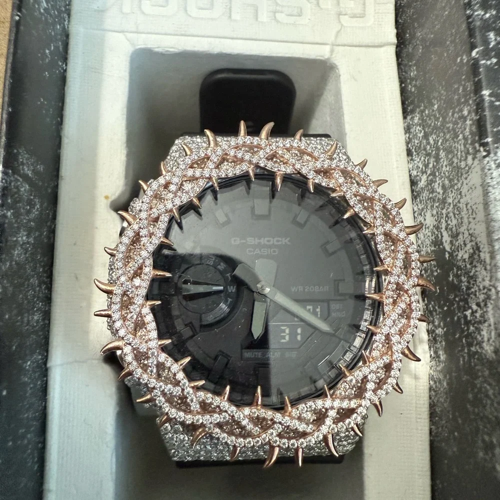 Casio G-Shock Black and Silver Watch with Rose Gold Accents